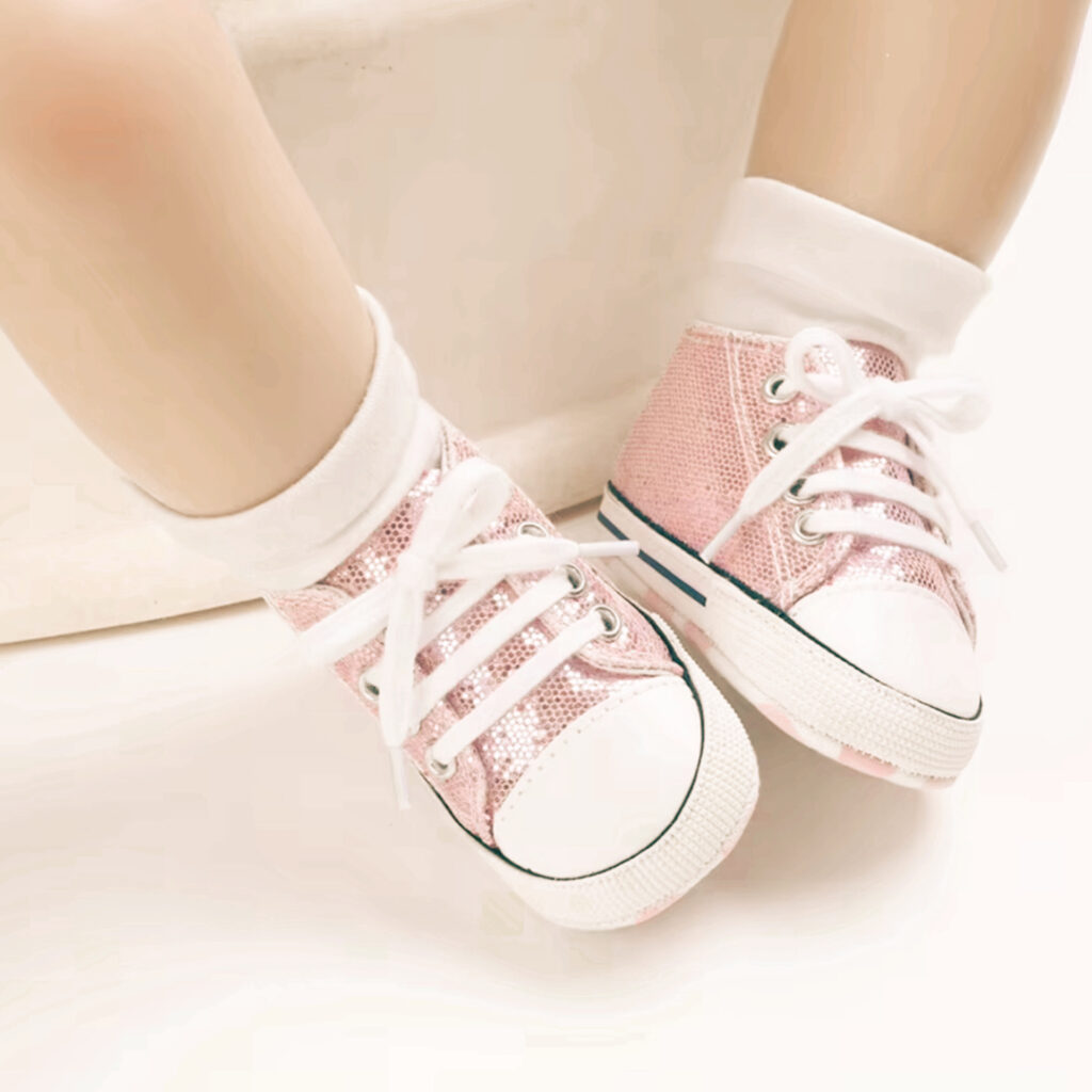 These adorable baby sneakers are designed with your little one’s comfort in mind. Made from high-quality, breathable materials, they feature a soft sole and flexible design, making them ideal for pre-walkers. The lace-up style ensures a secure fit while still being easy to put on and take off. Lightweight, stylish, and supportive, these sneakers provide just the right amount of protection for growing feet without restricting movement. A perfect blend of comfort and cuteness for your baby’s first steps!